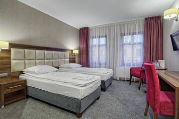 Фото номера Двухместный номер с 2 отдельными кроватями Отель Hotel Kamieniczka г. Легница 2