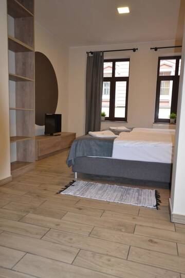 Фото номера Апартаменты с 1 спальней Апарт-отели SleepWell Apartments г. Легница 15