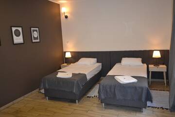 Фото номера Апартаменты с 1 спальней Апарт-отели SleepWell Apartments г. Легница 11