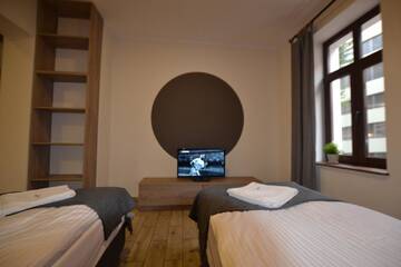 Фото номера Апартаменты с 1 спальней Апарт-отели SleepWell Apartments г. Легница 16