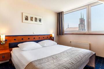 Фото номера Двухместный номер «Комфорт» с 1 кроватью и ванной Отель Qubus Hotel Legnica г. Легница 3